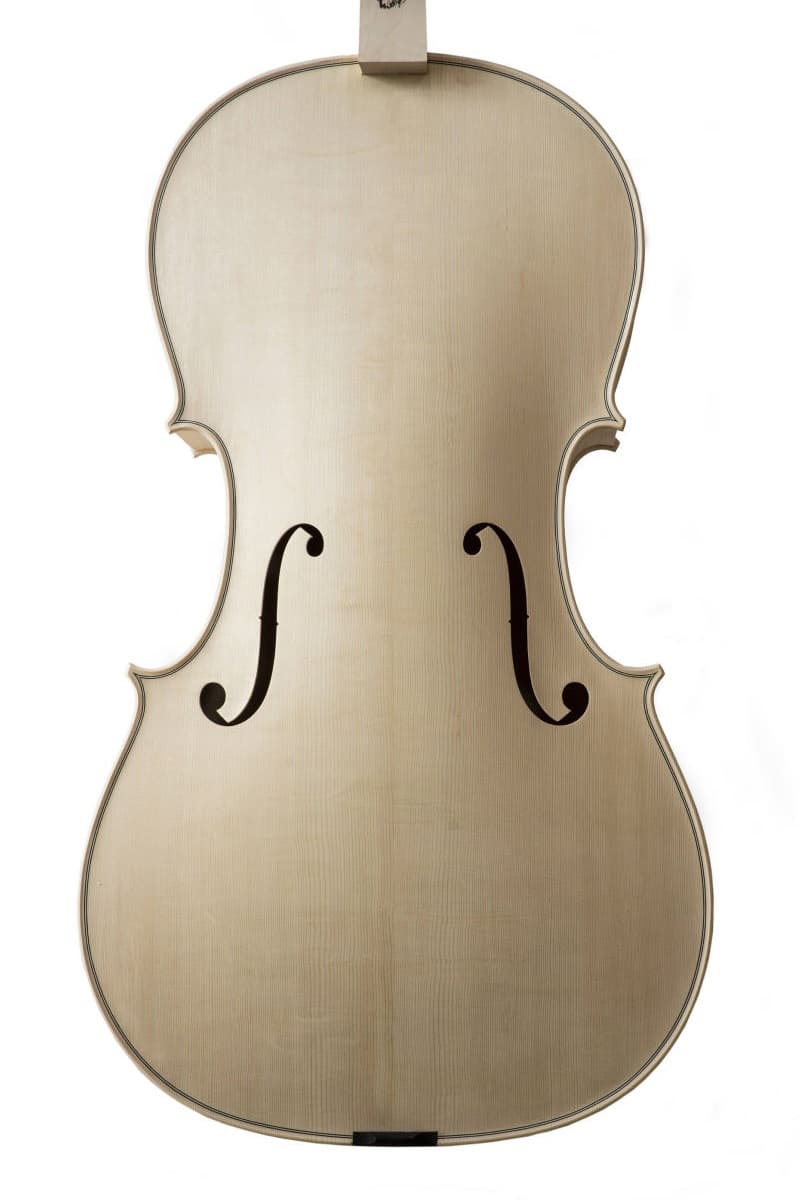 A white cello body before varnishing, showing the raw wood